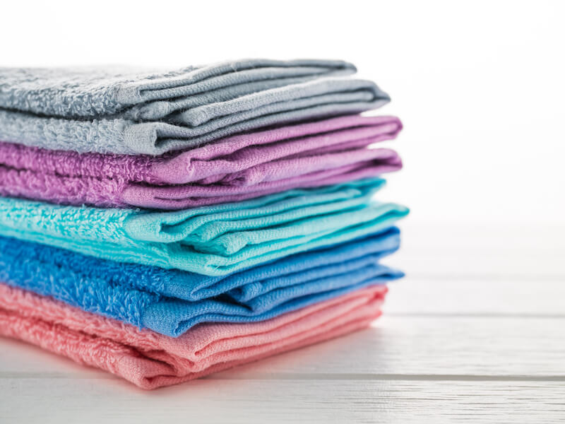 color of bath towel on white wooden background